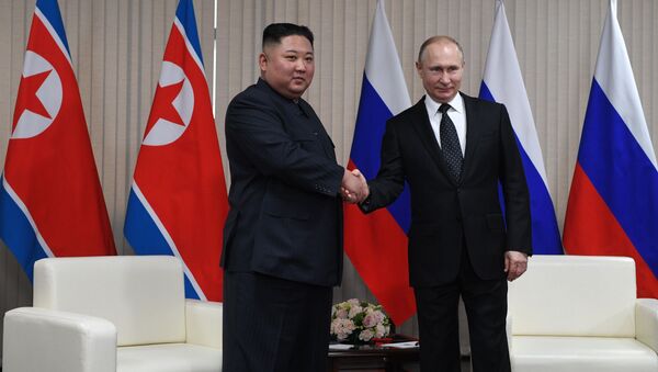 Kim Jong-un và Vladimir Putin  - Sputnik Việt Nam