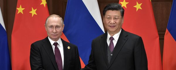 Tổng thống Nga Vladimir Putin  và Chủ tịch Trung Quốc Tập Cận Bình - Sputnik Việt Nam
