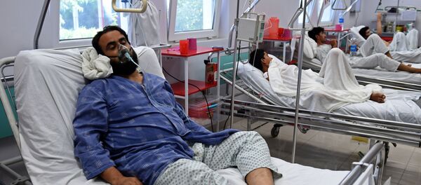 Nhân viên bệnh viện bị thương trong vụ bắn phá ở thành phố Kunduz, Afghanistan Nhân viên bệnh viện bị thương trong vụ bắn phá ở thành phố Kunduz, Afghanistan - Sputnik Việt Nam