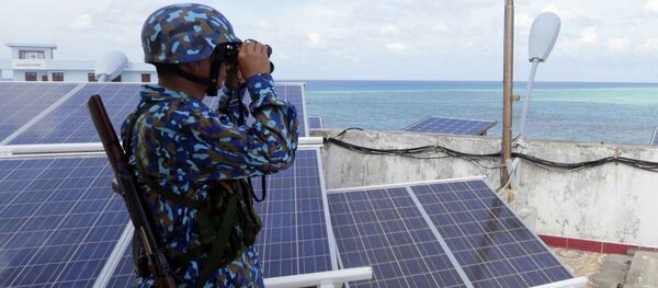 Chiến sỹ Trường Sa ngày đêm canh gác biển trời Tổ quốc. Chiến sỹ Trường Sa ngày đêm canh gác biển trời Tổ quốc. - Sputnik Việt Nam