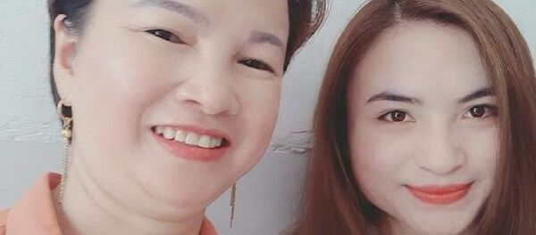 Bà Trần Thị Hiền và con gái Cao Thị Mỹ Duyên - Sputnik Việt Nam