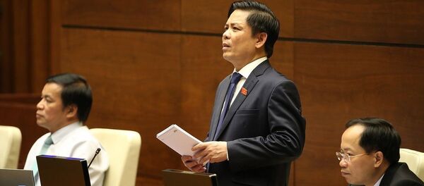 Bộ trưởng Bộ Giao thông vận tải Nguyễn Văn Thể trả lời chất vấn của đại biểu Quốc hội. Bộ trưởng Bộ Giao thông vận tải Nguyễn Văn Thể trả lời chất vấn của đại biểu Quốc hội. - Sputnik Việt Nam