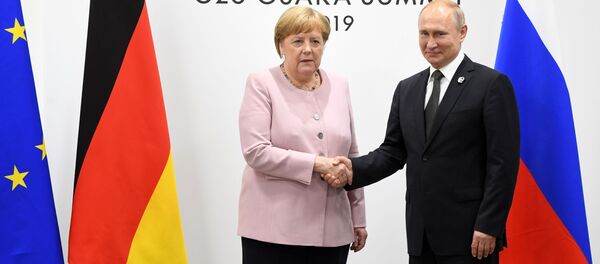 Ông Putin và bà Merkel - Sputnik Việt Nam