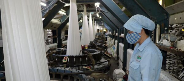 EVFTA sẽ có tác động tích cực đến dệt may Việt Nam trong dài hạn bởi 42,5% dòng thuế áp dụng đối với dệt may Việt Nam sẽ giảm về 0%.  - Sputnik Việt Nam