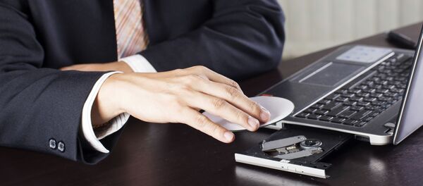 Doanh nhân với máy tính xách tay Doanh nhân với máy tính xách tay - Sputnik Việt Nam