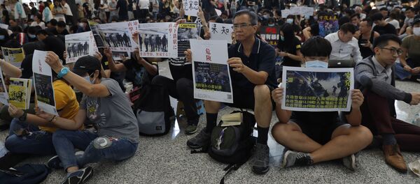 Cuộc biểu tình tại sân bay Hồng Kông Cuộc biểu tình tại sân bay Hồng Kông - Sputnik Việt Nam