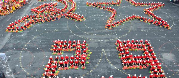 Màn đồng diễn xếp hình cờ Tổ quốc, cờ Đảng chào mừng Quốc khánh 2/9. Màn đồng diễn xếp hình cờ Tổ quốc, cờ Đảng chào mừng Quốc khánh 2/9. - Sputnik Việt Nam