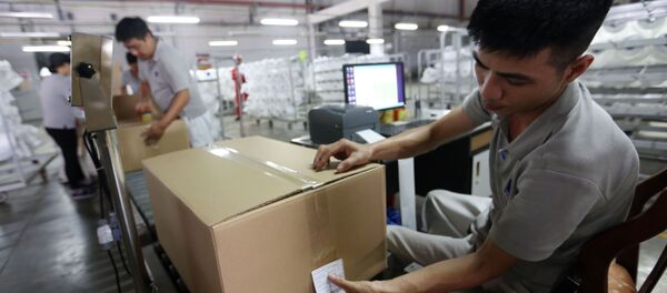 Đóng gói sản phẩm sợi DTY tại Nhà máy Xơ sợi Đình Vũ Đóng gói sản phẩm sợi DTY tại Nhà máy Xơ sợi Đình Vũ - Sputnik Việt Nam