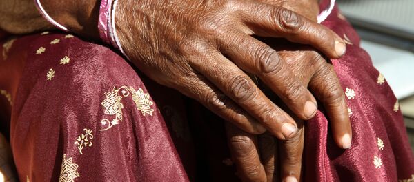 Một phụ nữ Ấn Độ. - Sputnik Việt Nam