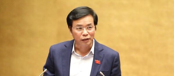 Tổng Thư ký, Chủ nhiệm Văn phòng Quốc hội Nguyễn Hạnh Phúc trình bày Báo cáo giải trình, tiếp thu, chỉnh lý dự án Luật sửa đổi, bổ sung một số điều của Luật Tổ chức Chính phủ và Luật Tổ chức chính quyền địa phương.  - Sputnik Việt Nam