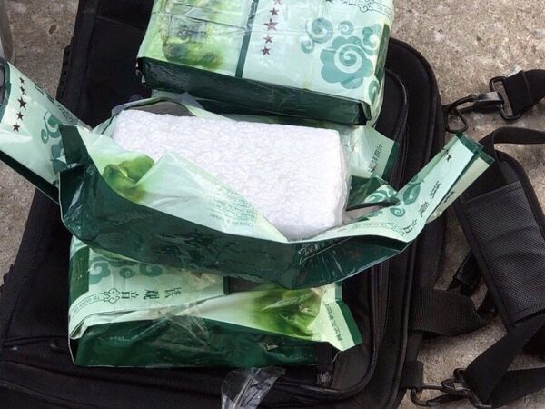 Khởi tố thanh niên vận chuyển gần 5kg ma tuý cùng khẩu súng có đạn - Sputnik Việt Nam