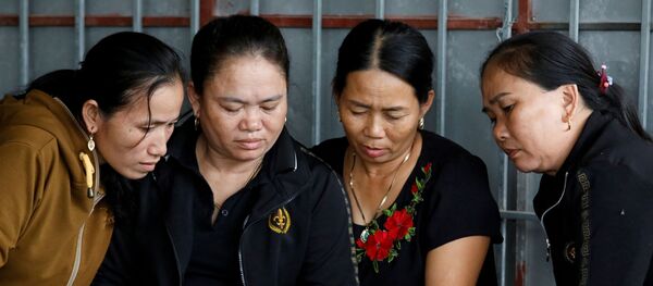 Người thân của Anna Bùi Thị Nhung, một trong những người có thể đã chết trong container ở Essex (Anh). - Sputnik Việt Nam