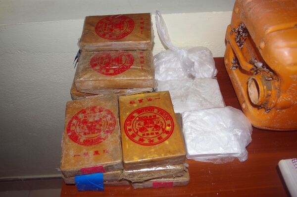 Hơn 20 bánh heroin in chữ Trung Quốc trôi dạt vào bờ biển Quảng Nam - Sputnik Việt Nam