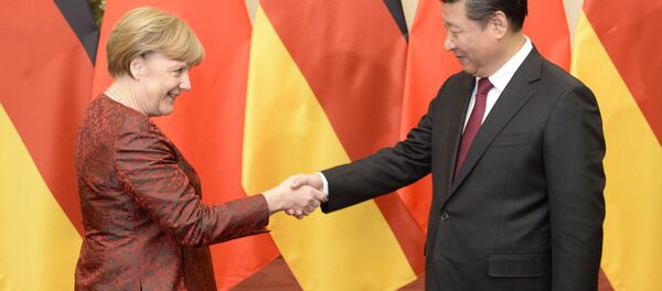 Bà Merkel và ông Tập Cận Bình. - Sputnik Việt Nam