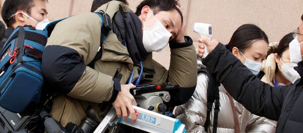 Kiểm tra nhiệt độ của các nhà báo ở Bắc Kinh - Sputnik Việt Nam