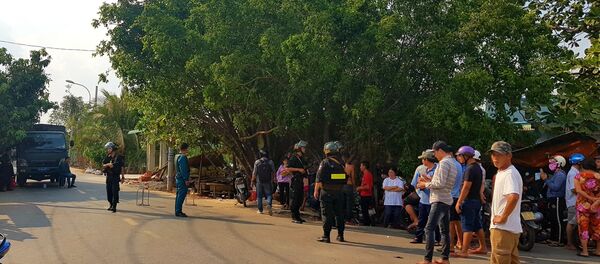 Công an phong tỏa, truy bắt đối tượng Tuấn trên địa bàn huyện Củ Chi.  - Sputnik Việt Nam