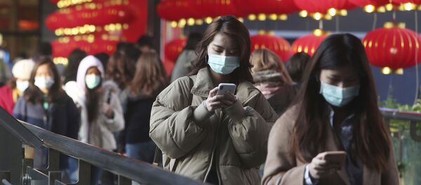 Những người đeo khẩu trang tại Đài Bắc, Đài Loan - Sputnik Việt Nam
