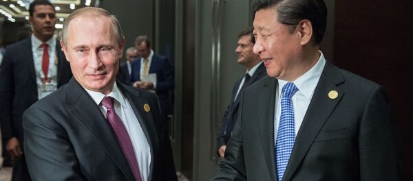 Tổng thống Nga Vladimir Putin và Chủ tịch Trung Quốc Tập Cận Bình tại hội nghị thượng đỉnh G20 ở Thổ Nhĩ Kỳ Tổng thống Nga Vladimir Putin và Chủ tịch Trung Quốc Tập Cận Bình tại hội nghị thượng đỉnh G20 ở Thổ Nhĩ Kỳ - Sputnik Việt Nam