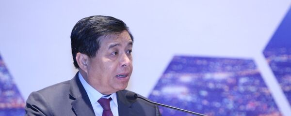 Bộ trưởng Bộ Kế hoạch và Đầu tư Nguyễn Chí Dũng phát biểu tại hội nghị - Sputnik Việt Nam