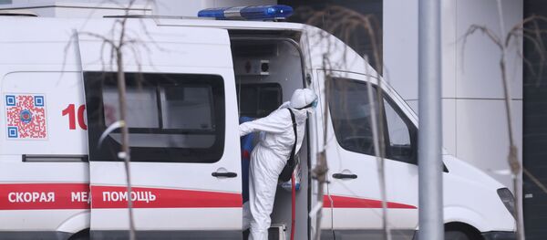 Bác sĩ nhóm Cấp cứu tại bệnh viện dành cho các trường hợp nghi nhiễm coronavirus ở Kommunarka, ngoại ô Matxcơva Bác sĩ nhóm Cấp cứu tại bệnh viện dành cho các trường hợp nghi nhiễm coronavirus ở Kommunarka, ngoại ô Matxcơva - Sputnik Việt Nam