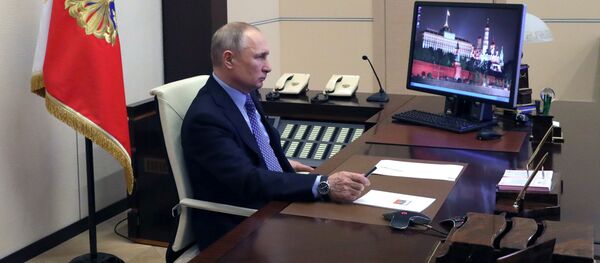 Tổng thống Nga Vladimir Putin tổ chức một cuộc họp video. Tổng thống Nga Vladimir Putin tổ chức một cuộc họp video. - Sputnik Việt Nam
