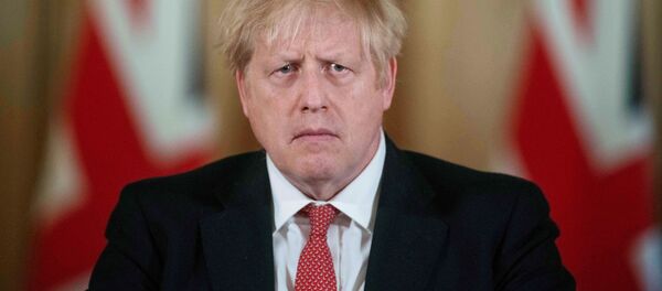 Thủ tướng Anh Boris Johnson tại một cuộc họp báo ở London, Vương quốc Anh Thủ tướng Anh Boris Johnson tại một cuộc họp báo ở London, Vương quốc Anh - Sputnik Việt Nam