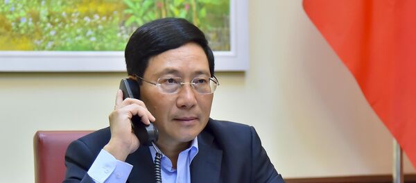 Phó Thủ tướng, Bộ trưởng Bộ Ngoại giao Phạm Bình Minh điện đàm với Bộ trưởng Ngoại giao Nhật Bản Motegi Toshimitsu về hợp tác ứng phó với dịch bệnh COVID-19. - Sputnik Việt Nam