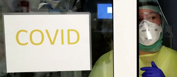 Nhân viên y tế tại phòng chăm sóc đặc biệt tại bệnh viện ở Brussels, Bỉ Nhân viên y tế tại phòng chăm sóc đặc biệt tại bệnh viện ở Brussels, Bỉ - Sputnik Việt Nam