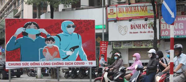 Mỗi người dân cần tiếp tục nâng cao ý thức phòng, chống dịch trong cuộc sống hàng ngày. - Sputnik Việt Nam