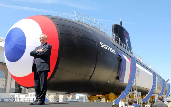Naval Group CEO Herve Guillou poses during the official launch of the new French nuclear submarine Suffren, built by Naval Group, at the French naval base in Cherbourg, north-western France on July 12, 2019. - The 99-metre-long black steel monster is named after Pierre-Andre Suffren, an admiral who distinguished himself against the English in the 18th century. The actual launch will only take place at the end of July, with a three-year delay, before dockside tests, then at sea, and its delivery to the French Navy in Toulon before summer 2020. Naval Group CEO Herve Guillou poses during the official launch of the new French nuclear submarine Suffren, built by Naval Group, at the French naval base in Cherbourg, north-western France on July 12, 2019. - The 99-metre-long black steel monster is named after Pierre-Andre Suffren, an admiral who distinguished himself against the English in the 18th century. The actual launch will only take place at the end of July, with a three-year delay, before dockside tests, then at sea, and its delivery to the French Navy in Toulon before summer 2020. - Sputnik Việt Nam