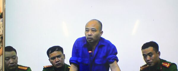 Tại phiên xử Nguyễn Xuân Đường (còn gọi là Đường Nhuệ) được triệu tập đến tòa nhưng bố trí ở một phòng khác trả lời trực tuyến hội đồng xét xử.  - Sputnik Việt Nam