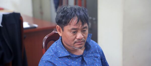 Nghi can Đỗ Văn Minh tại cơ quan công an Nghi can Đỗ Văn Minh tại cơ quan công an - Sputnik Việt Nam