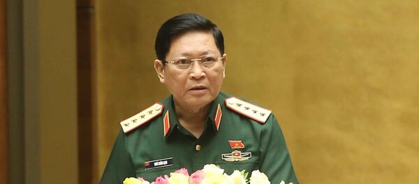 Bộ trưởng Bộ Quốc phòng Ngô Xuân Lịch trình bày Tờ trình về dự án Luật Biên phòng Việt Nam. - Sputnik Việt Nam