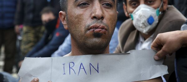 Một người Iran biểu tình phản đối trên biên giới giữa Hy Lạp và Macedonia Một người Iran biểu tình phản đối trên biên giới giữa Hy Lạp và Macedonia - Sputnik Việt Nam
