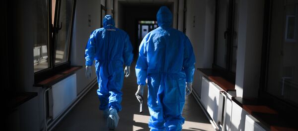 Các bác sĩ tại bệnh viện để điều trị COVID-19 bị nhiễm coronavirus trong CITO. N. N. - Sputnik Việt Nam