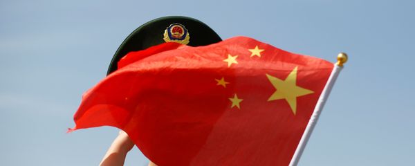Cậu bé mặc áo phông có cờ của Trung Quốc. Cậu bé mặc áo phông có cờ của Trung Quốc. - Sputnik Việt Nam
