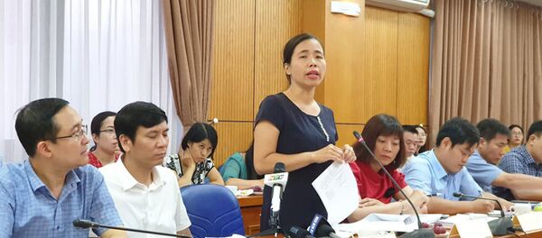 Bà Đặng Kim Hoa, phó cục trưởng Cục Bổ trợ tư pháp Bộ Tư pháp, thông tin tại buổi họp báo - Sputnik Việt Nam