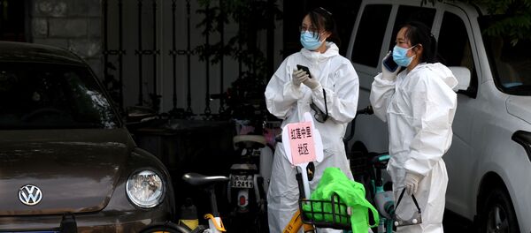 Nhân viên y tế tại chợ bán buôn nông sản Tân Phát Địa (Xinfadi), Bắc Kinh Nhân viên y tế tại chợ bán buôn nông sản Tân Phát Địa (Xinfadi), Bắc Kinh - Sputnik Việt Nam