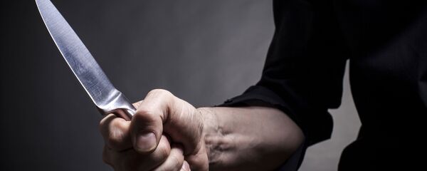 Người đàn ông cầm dao - Sputnik Việt Nam