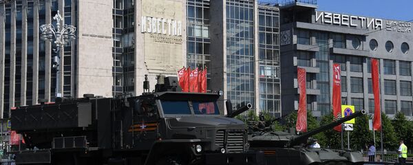 Hệ thống súng phun lửa hạng nặng (TOS) của hệ thống tên lửa phóng đa năng Tosochka của Tosh-2 tại Diễu hành Chiến thắng ở Moscow Hệ thống súng phun lửa hạng nặng (TOS) của hệ thống tên lửa phóng đa năng Tosochka của Tosh-2 tại Diễu hành Chiến thắng ở Moscow - Sputnik Việt Nam