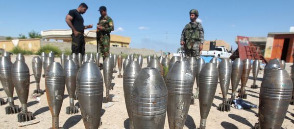 Cảnh sát Iraq khám xét đạn dược của chiến binh Daesh ở Tikrit - Sputnik Việt Nam