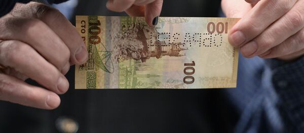 Ngân hàng Trung ương phát hành đồng tiền kỷ niệm Crưm sáp nhập Nga - Sputnik Việt Nam